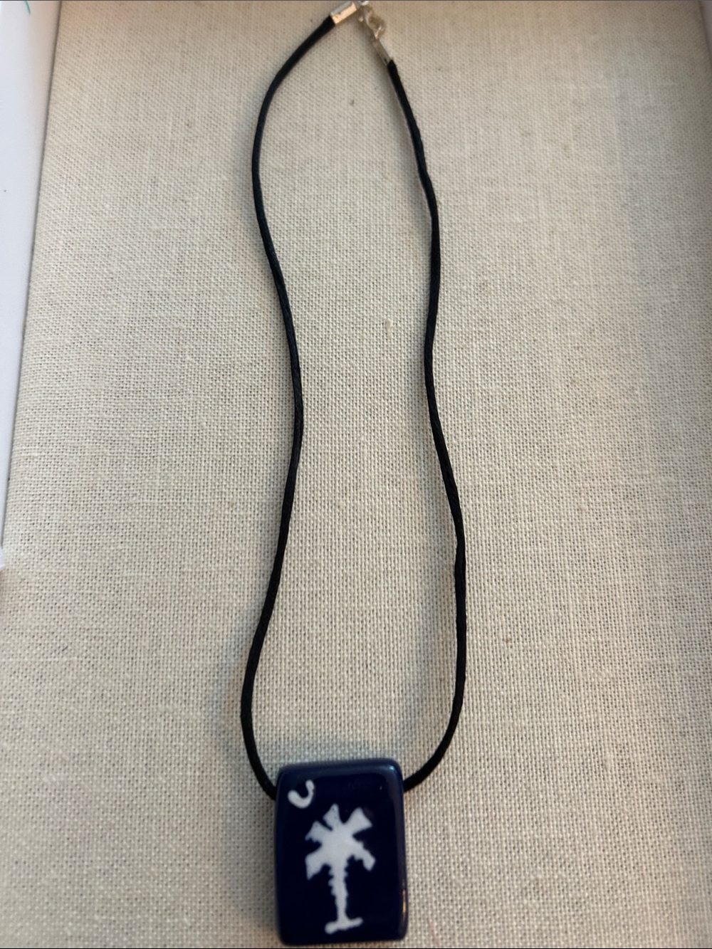 Blue Necklace on black cord with South Carolina Palmetto Tree Pendant